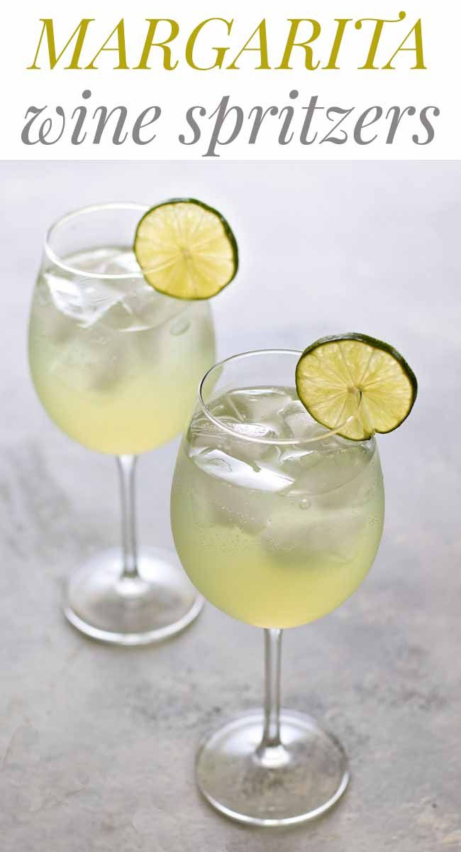 margarita wine spritzers in glasses with limes on the rim