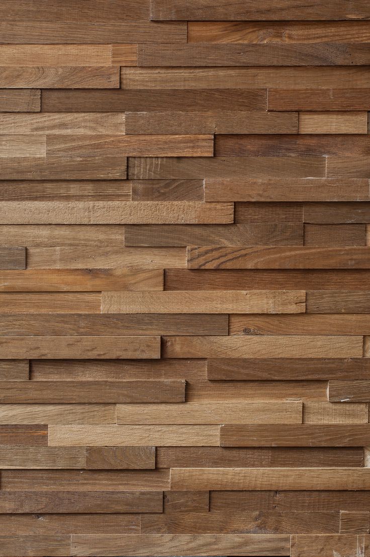 a wooden wall that is made out of wood planks