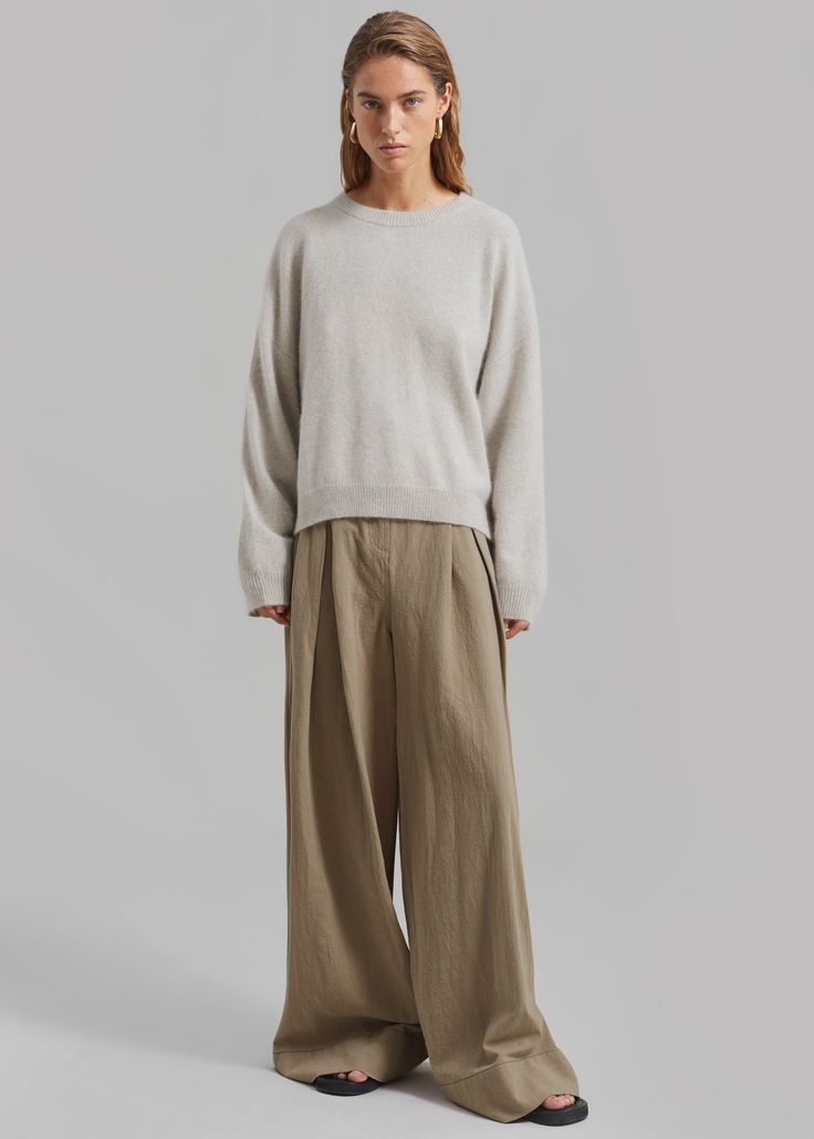 Color: Trench Midweight linen cotton blend Relaxed fit Wide leg High rise Pleated detailing Slant hip pockets Illusion welt back pockets Belt loops Zip fly Front button closure Unlined 55% Linen 45% Cotton Delicate Machine Wash By The Garment. Imported Embroidered Seashell, Ankara Pants, Loulou Studio, Rib Knit Fabric, Nylon Pants, Color Stone, Pocket Belt, Oversized Sweater, Rib Knit