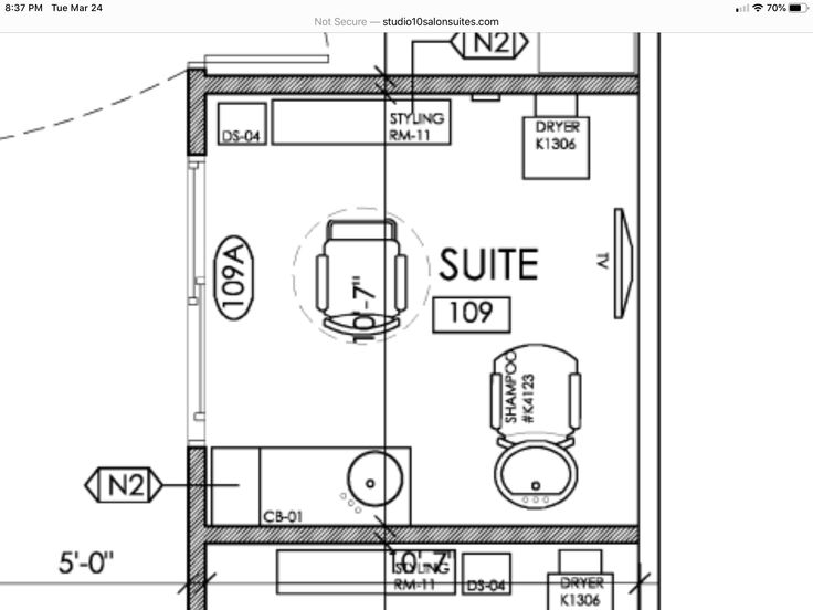 the floor plan for a small apartment with an attached bathroom and living room in it