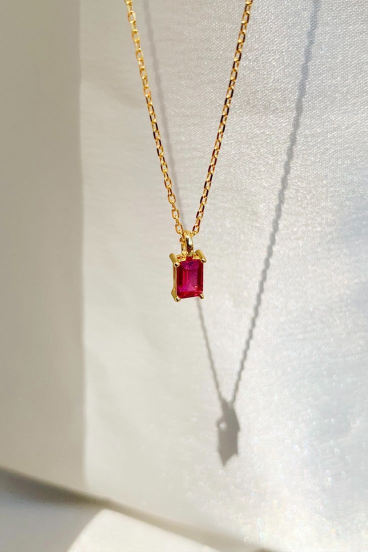 Make a statement with our Ruby Birthstone Necklace, the perfect accessory for any outfit. The ruby gemstone adds a pop of color and sophistication to any look, while the delicate 14k gold-filled chain gives it a touch of elegance. Gift it to your loved ones born in July or to anyone who appreciates a stunning piece of jewelry! 💎 #gemstonejewelry #giftsforher #rubynecklace #goldjewelry #birthdaygift #spring2023 #summerfashion #birthstonejewelry Born In July, Ruby Birthstone, July Birthday, Ruby Necklace, July Birthstone, Ruby Gemstone, Birthstone Necklace, Birthstone Jewelry, Birthstone