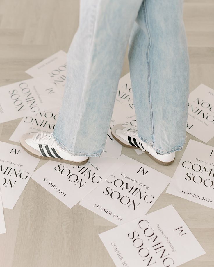 a person standing on top of a pile of paper