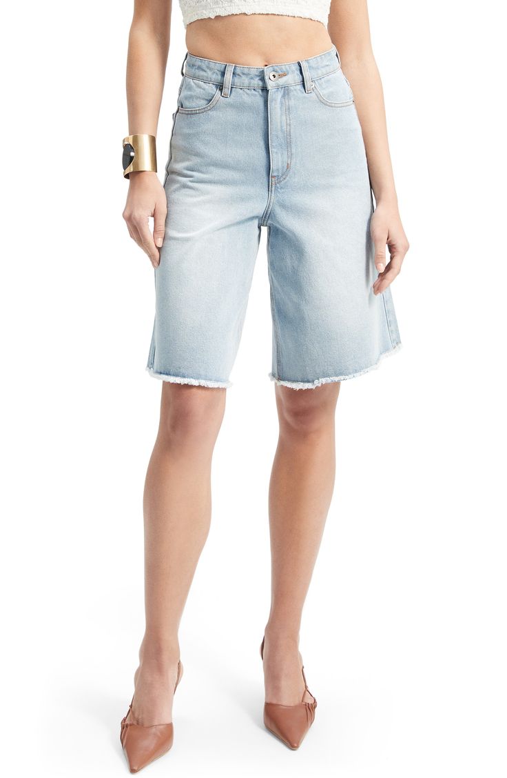 Refresh your denim with faded nonstretch shorts flaunting a fitted high waist and roomy legs that relax into frayed, knee-length hems. Zip fly with button closure Front scoop pockets; back patch pockets 100% cotton Machine wash, line dry Imported Long Denim Shorts, Cut Off Shorts, Womens Bottoms, Knee Length, Denim Shorts, High Waist, Size 10, Nordstrom, High Waisted