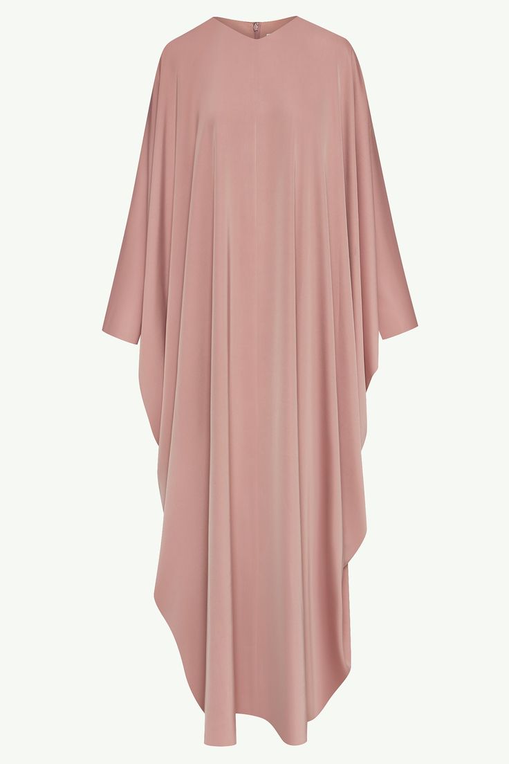 Introducing the Anisa Satin Kaftan in Dusty Rose. This luxurious kaftan features a flowy relaxed style that drapes elegantly, with a subtle v neck and billowy sleeves that add a touch of sophistication. Perfect for a glamorous evening or Ramadan nights. Model is 5'7" and is wearing XS/58". Traditional Flowy V-neck Kaftan, Elegant Pink Silk Kaftan, Luxury Flowy Pink Kaftan, Luxury Georgette V-neck Kaftan, Luxury Pink V-neck Kaftan, Ramadan Nights, Open Abayas, Satin Kaftan, Abaya Collection