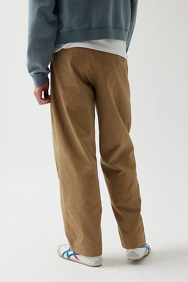 Essential chino pants in a relaxed & baggy skate fit silhouette. Chinos in 100% cotton with a straight leg fit. Features UO Turbo baggy skate chino Relaxed fit chino pants Mid rise waist Zip fly; button closure Straight leg openings Content + Care 100% Cotton Machine wash Imported Size + Fit Model in Slate is 6’1.5" and wearing size 32/32 Measurements taken from size 32/32 Rise: 11" Inseam: 32" Leg opening: 9" | Urban Outfitters UO Turbo Baggy Skate Chino Pant in Tan, Men's at Urban Outfitters Relaxed Fit Chino Cotton Twill Pants With Cargo Pockets, Streetwear Chinos With Pockets And Straight Hem, Straight Hem Chinos For Streetwear With Pockets, Streetwear Chino Cotton Twill Pants With Pockets, Utility Straight Leg Sweatpants For Streetwear, Chino Cotton Twill Pants With Pockets For Streetwear, Streetwear Straight Fit Bottoms With Pockets, Relaxed Fit Cotton Sweatpants With Straight Leg, Streetwear Bottoms With Pockets And Straight Fit