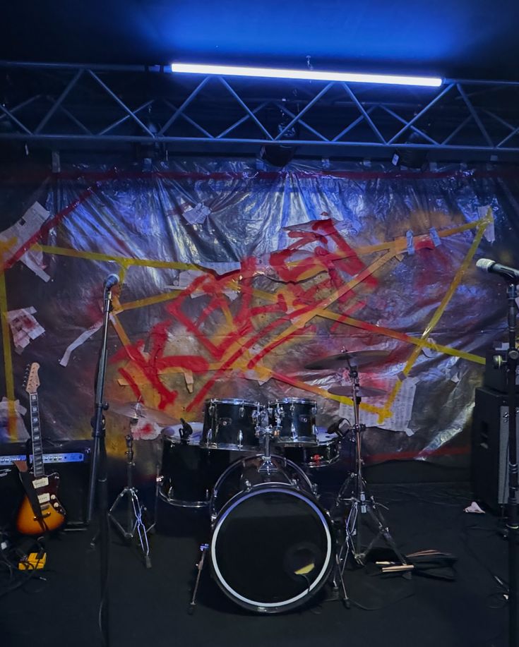 a drum set sitting on top of a stage