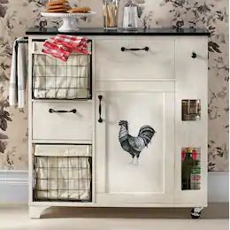 an old fashioned white cabinet with rooster decals on the doors and drawers, in front of floral wallpaper