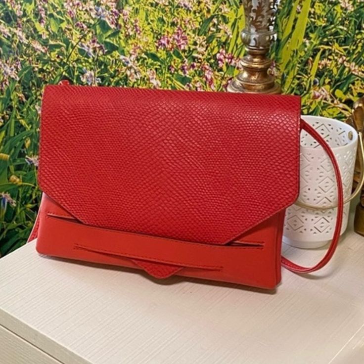 Banana Republic Leather Crossbody Bag Size 8.75” By 7” Red Rectangular Phone Bag With Detachable Strap, Formal Red Flap Bag With Magnetic Closure, Elegant Red Evening Bag For Mobile Phone, Chic Red Rectangular Phone Bag, Elegant Red Phone Bag With Removable Pouch, Elegant Red Shoulder Bag For On-the-go, Red Pouch Evening Bag With Detachable Handle, Modern Red Flap Bag For Daily Use, Red Evening Bag With Mobile Phone Holder