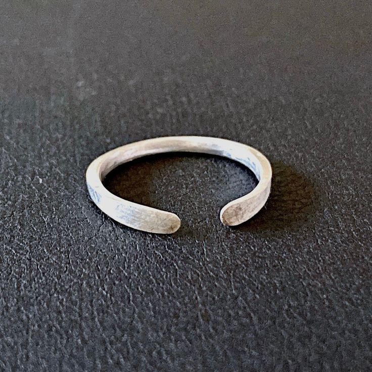 This silver adjustable open ring is easy to slip over knuckles. Great for stackable Wear alone or stack with other rings. The ring is made of square wire and tapered on both end to give it a beautiful geometric, minimalist look. + most common size for women is 5-7. adjustable open ring makes 6 an ideal size. + find your ring size ( http://www.ringsizes.co/). + packaged in a gift box and makes great gifts for birthday, anniversary, or holiday ∙ ∙ ∙ ∙ ∙ ∙ ∙ ∙ ∙ ∙ ∙ ∙ ∙ ∙ ∙ ∙ ∙ ∙ ∙ ∙ ∙ ∙ ∙ ∙ ∙ ∙ ∙ Gifts For Birthday, Cuff Ring, Cuff Rings, Ring Dainty, Open Ring, Stackable Rings, Fine Silver, Silver Band, Mother's Day Gift