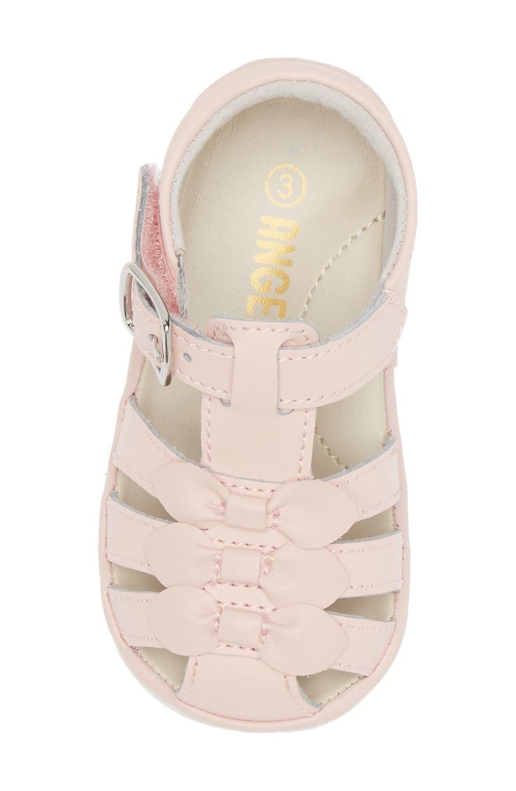 Your little one will love stepping out in this soft leather fisherman sandal topped with a dainty bow and outfitted with an arch-supporting footbed. Adjustable hook-and-loop strap Leather upper and lining/rubber sole Imported Pink Open Toe Sandals With Bow Straps, Pink Sandals With Bow Straps For Summer, Spring Sandals With Bow And Round Toe, Cute Bow Sandals With Round Toe, Cute Sandals With Bow And Round Toe, Spring Bow Strap Sandals With Round Toe, Bow Sandals, Stepping Out, Little One