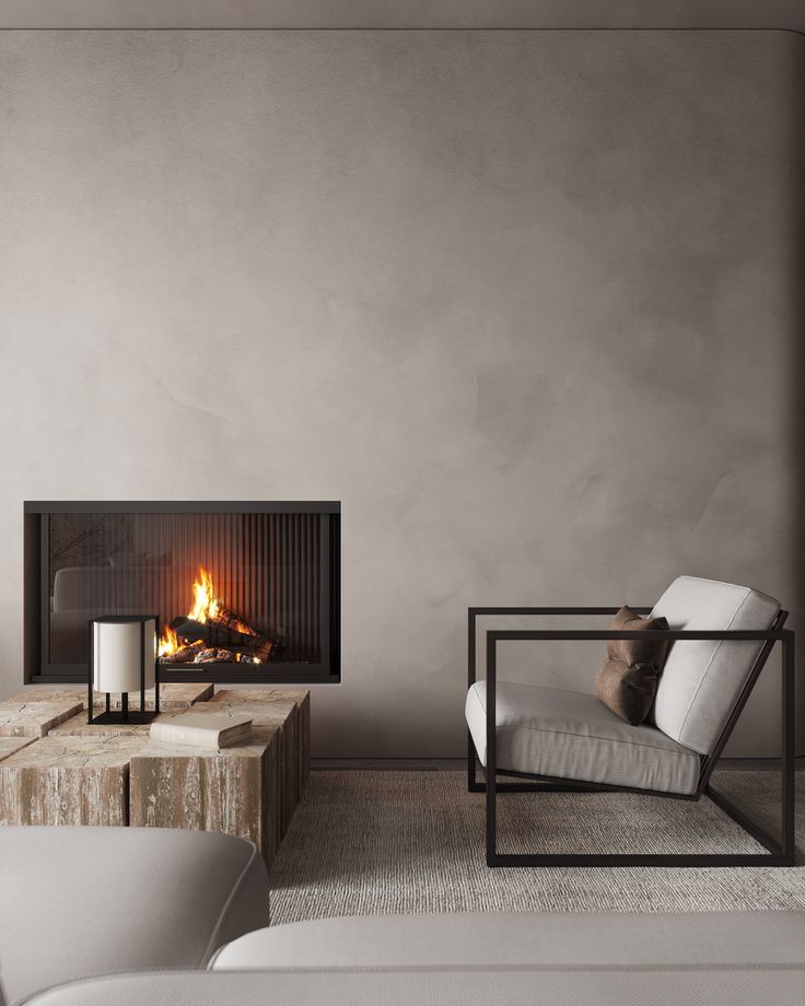 a living room filled with furniture and a fire place next to a wall mounted fireplace