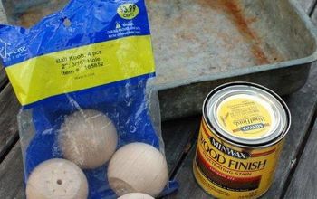 an assortment of food items sitting on a wooden table next to a bag of eggs