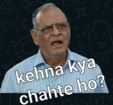 an old man with glasses is making a face and has the words kehna ky chahte no?