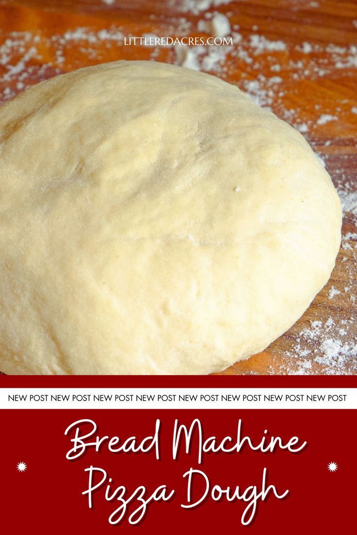 bread machine pizza dough sitting on top of a wooden table