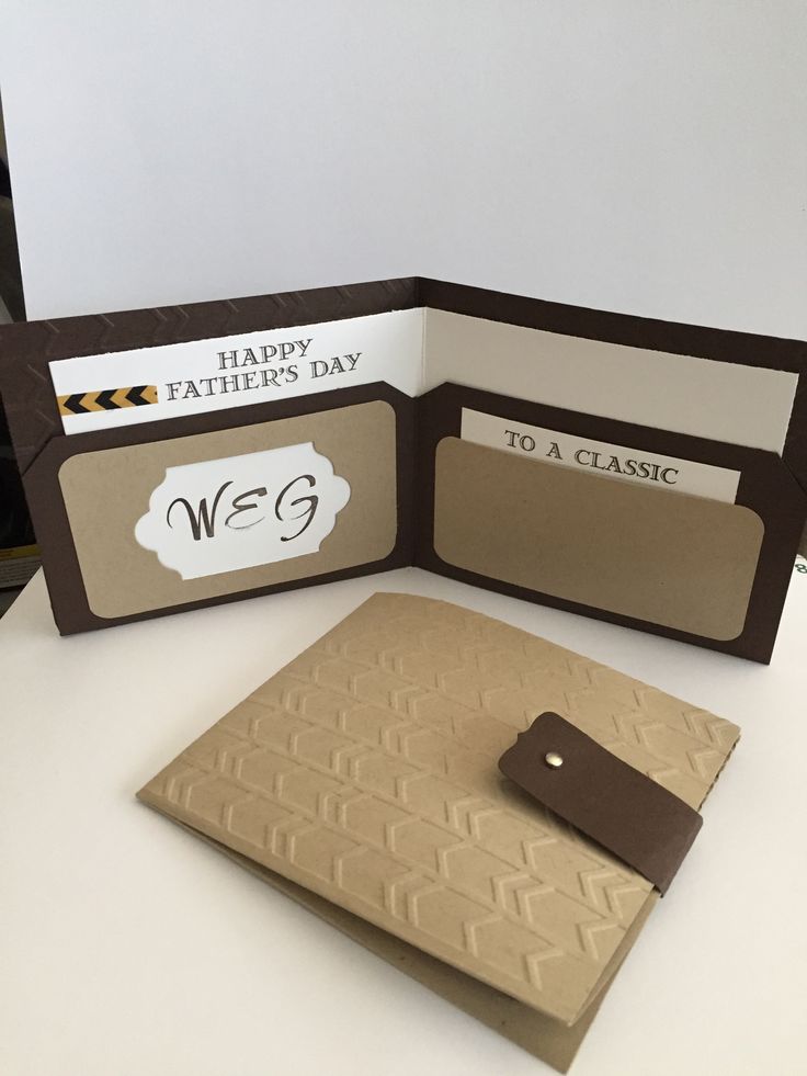 a father's day card made out of brown and white paper with a notepad on it