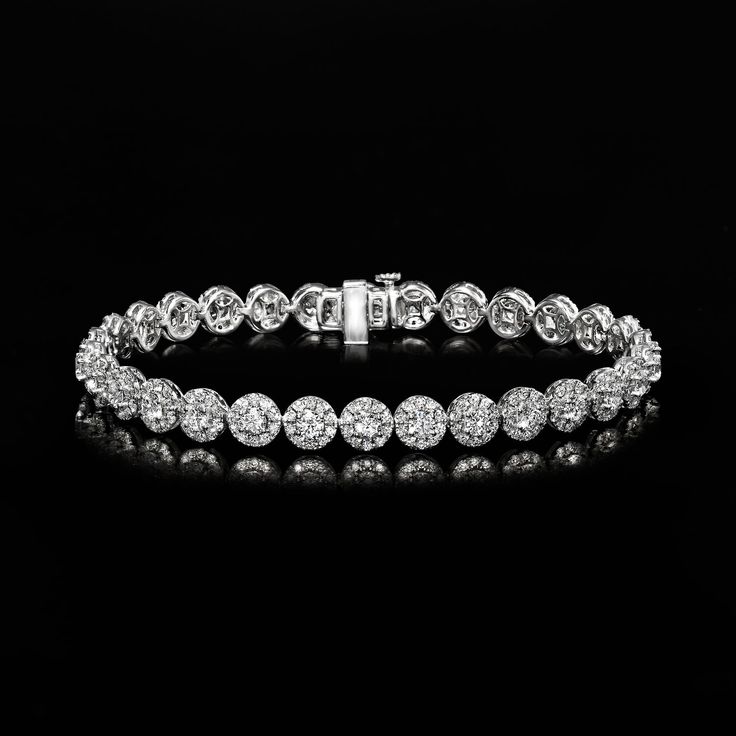 Ross-Simons - 5.60ct t. w. Lab Grown Diamond Halo Bracelet in 14kt White Gold. 8". Absolutely stunning! Our exquisite bracelet dazzles with 5.60 ct. t. w. round brilliant-cut lab-grown diamonds in halo-style links. Finely crafted in polished 14kt white gold. Lab-grown diamonds are identical to mined diamonds according to their optical, physical and chemical properties. All Ross-Simons lab-grown diamond jewelry in 14kt gold and platinum includes an IGI Laboratory-Grown Diamond Report to verify co Formal Round Lab-grown Diamond Bracelet, Luxury White Gold Lab Grown Diamond Bracelet, White Gold Bracelets With Diamond Cut Lab-grown Diamonds, Luxury Brilliant Cut Lab-grown Diamond Bracelet, Luxury Lab-grown Diamond Bracelet In Diamond White, Halo Bracelet, Physical And Chemical Properties, Pure Design, Platinum Jewelry