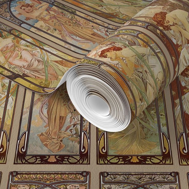 the ceiling is decorated with art nouveau paintings and decorative artwork, including a rolled up sheet of paper