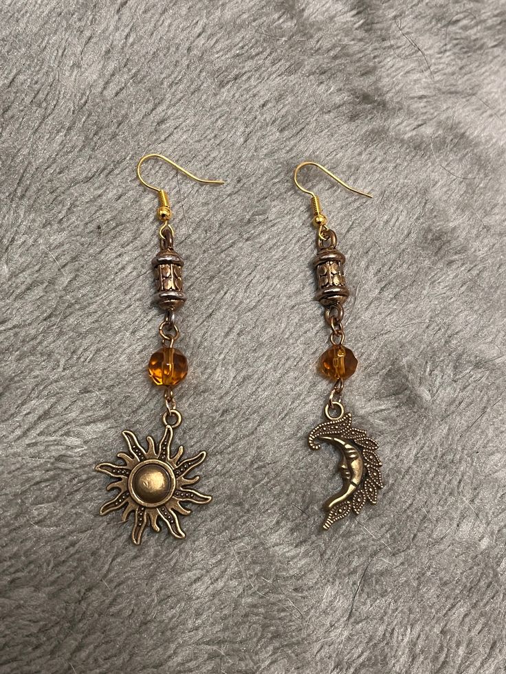 Dangle bronze earrings with a sun and moon charm. Hook is made from hypoallergenic gold plated alloy. Sun Aesthetic Jewelry, Sun Gold Earrings, Sun And Moon Jewelry, Gold Sun Earrings, Sun Accessories, Sun Moon Earrings, Sun And Moon Earrings, Cottagecore Earrings, Sun Jewelry