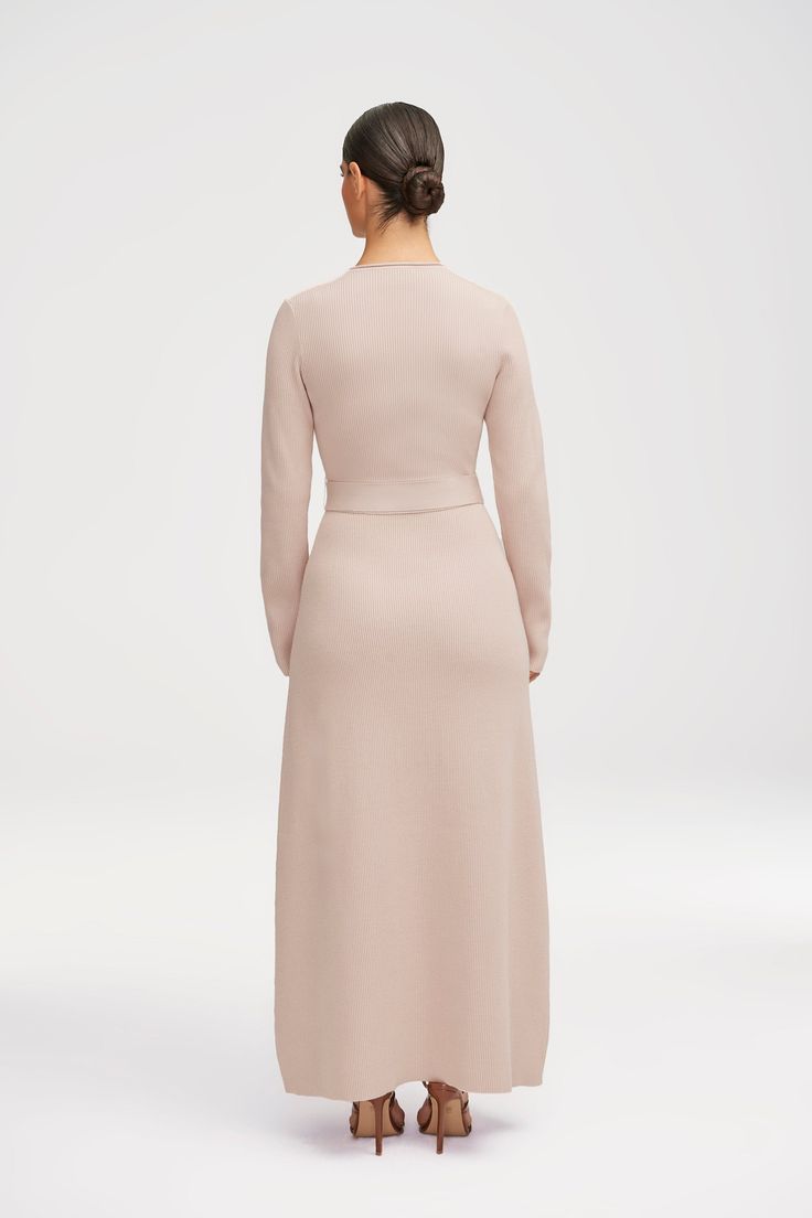 Elevate your wardrobe with the Rima Belted Knit Maxi Dress. Crafted from a fine ribbed knit, this dress exudes luxury. The matching belt cinches at the waist for a flattering silhouette. Style it up for a sophisticated look or dress it down to suit any occasion. Model is 5'6 and is wearing size S/54". Jersey Hijab, Knit Maxi Dress, Sophisticated Look, Maxi Dress Sale, Maxi Knit Dress, Beautiful Gift Boxes, Xl Dress, Dresses For Sale, Beautiful People