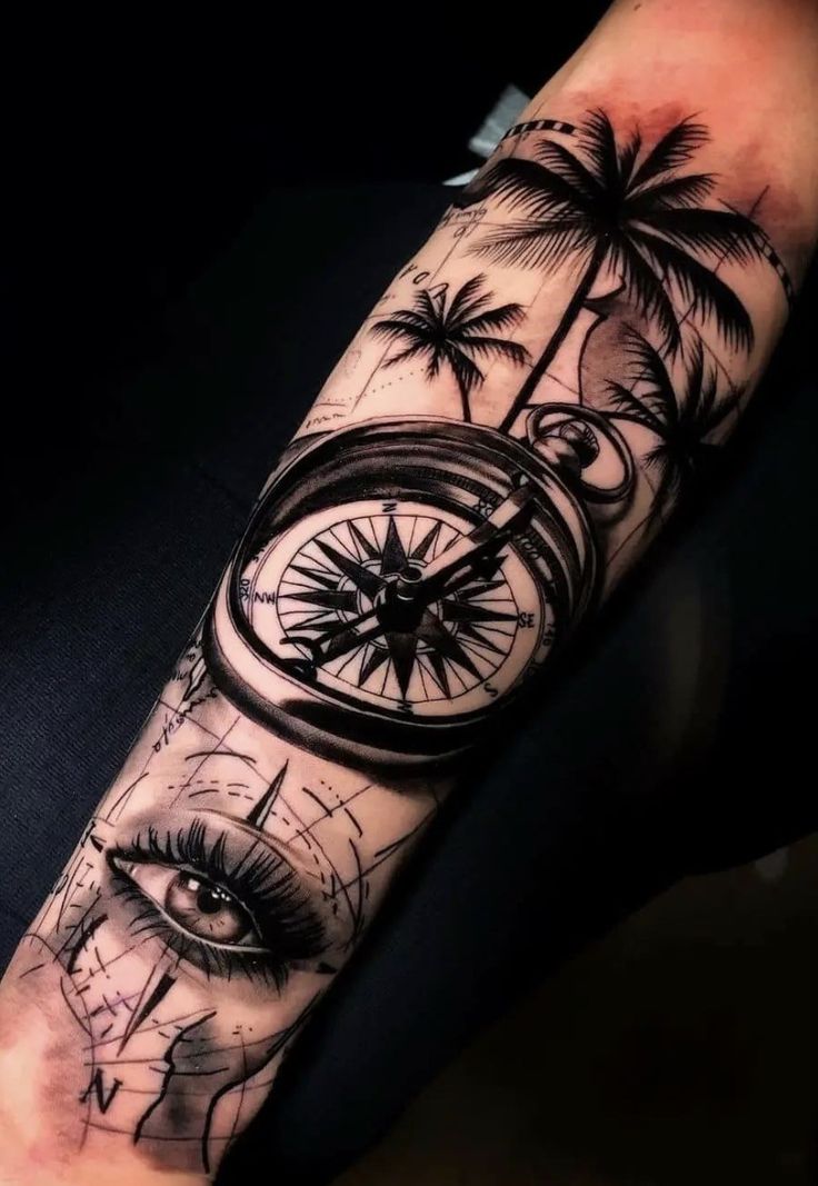 a man's arm with an eye and palm trees on it, while the clock is