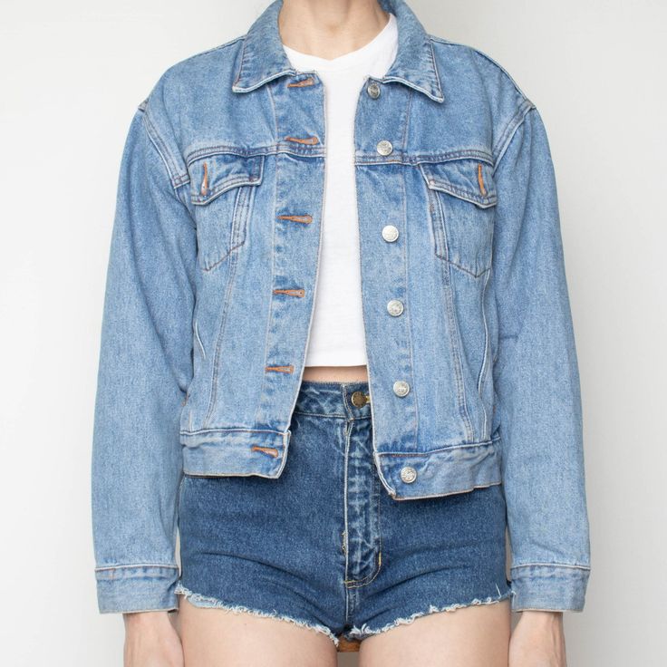 80s cropped denim jacket in the perfect natural vintage fade. in-seam pockets and buttoned flat pockets. adjustable button tabs at waist. Size: labeled M - fits S-M Label: susquehana blues Bust: 42" Waist: 35" Shoulder width: 18" Length: 20" Sleeve length (from center back neck): 31" Content: 100% cotton Spring Light Wash Denim Jacket With Buttoned Pockets, Light Wash Button-up Denim Jacket, Blue Cropped Jacket With Button Closure, Relaxed Fit Light Wash Denim Jacket With Snap Buttons, Light Wash Relaxed Fit Denim Jacket With Snap Buttons, Light Wash Denim Jacket With Button Closure, Light Wash Denim Jacket With Snap Buttons, Medium Wash Cropped Jacket With Pockets For Spring, Washed Blue Denim Jacket With Snap Buttons