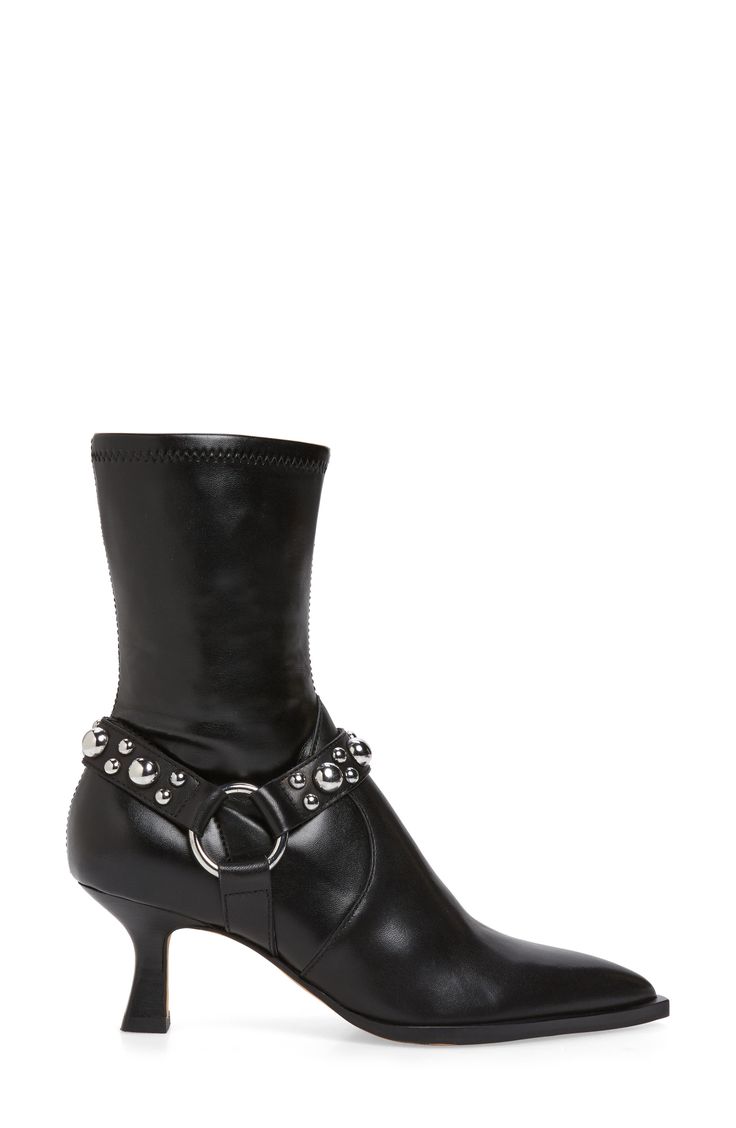 Polished studs highlight the harness strap of a moto-chic bootie complete with a pointy toe. 2 1/4" heel (size 8.5) 7" shaft Side zip closure Synthetic and leather upper/textile, synthetic and leather lining/synthetic sole Imported Fall Spiked Ankle Platform Boots, Edgy Studded Platform Boots For Fall, Edgy Leather Platform Boots With Studs, Edgy High Heel Moto Boots With Rivets, Edgy Fall Platform Boots With Studded Outsoles, Edgy Fall Boots With Grommets, Edgy Boots With Grommets For Fall, Edgy Grommet Boots For Fall, Studded High Heel Platform Boots For Fall