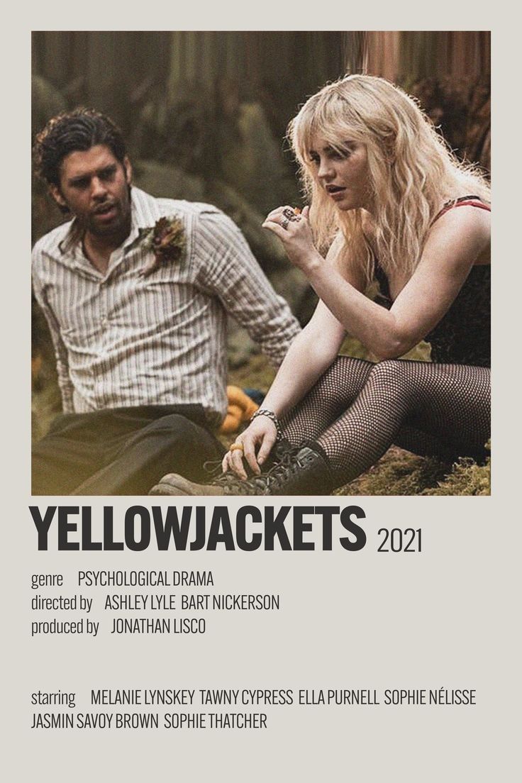 a man and woman sitting next to each other in front of a white poster with the words yellowjackets on it