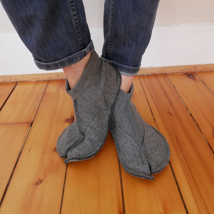 "Toebiter split toe (tabi) slippers and socks are made from felted sweater knit. Keep that big toe separated. SHORTY version, ankle height, 4\" tall. (Regular mid-calf version: https://www.etsy.com/listing/858002668/wool-split-toe-house-slippers-tabi-socks) This is a listing for a made-to-order pair. The slippers are made from a choice of soft, dense wool blend knits. Please state shoe size when ordering -- US (gender + size) or Euro sizing is fine.   REGULAR mid-calf slipper style: https://www.etsy.com/daphneboard/listing/858002668 MORE listings, including ready-to-ship: https://www.etsy.com/shop/daphneboard All seams are zigzag stitched for durability; slippers have somewhat traditional Japanese tabi-styling (split toe, quilted side panels and heel cup). Soles are double-thick. Wool blen Ordered Pairs, Tabi Socks, Shoe Making, House Slippers, Sweater Knit, Panel Siding, Japanese Traditional, Mid Calf, Cyberpunk