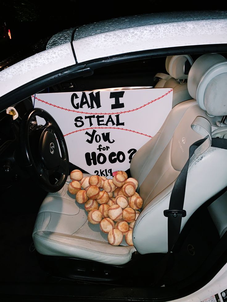 a car with a sign that says can i steal you for hoo?