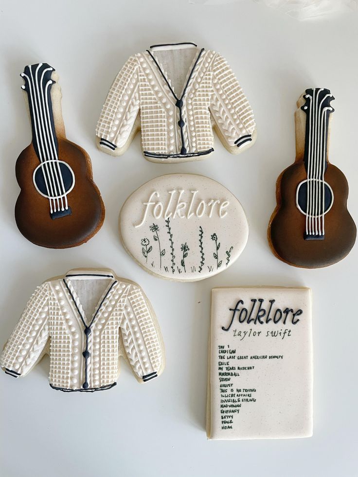 cookies decorated to look like guitars and clothes