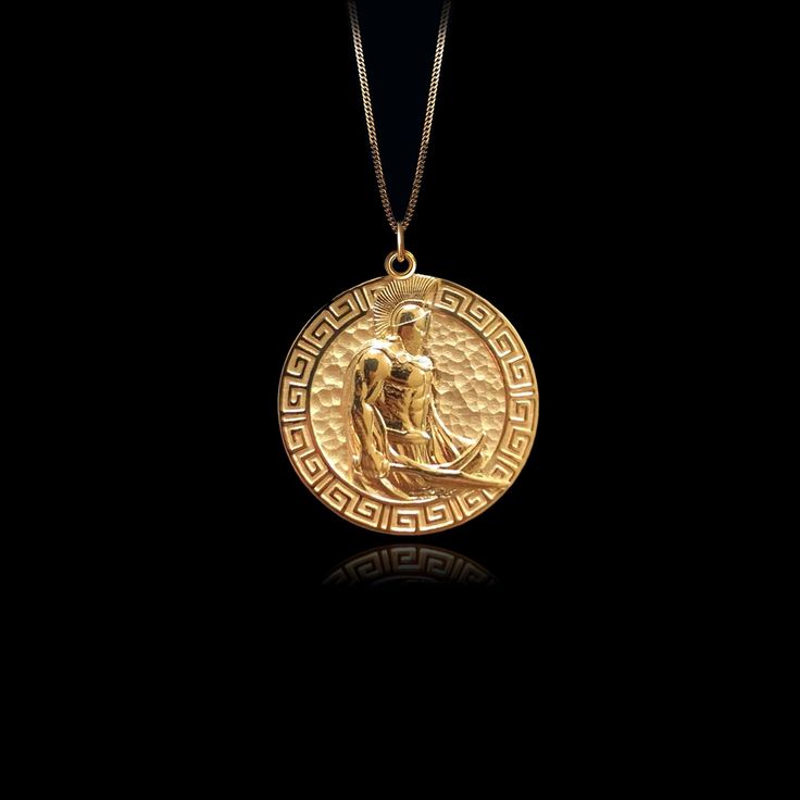 Channel your inner warrior with our Spartan pendant. Handcrafted with precision, this bold piece symbolizes strength, bravery, and honor. Wear it as a reminder of your resilience and unyielding spirit, embracing the courage and determination of the legendary Spartan warriors. PENDANT INFORMATIONThis pendant is made of real, solid gold.• Made in USA• Material: 14k or 18k solid gold• Finish: polished• Height: 1.1" (28,5 mm) x Width: 1" (25,5 mm)• Pendant weight: approx. 6 grams (14k)• Bail: fits u Phoenix Pendant, Spartan Helmet, Inner Warrior, Gold Dragon, Small Circle, Solid Gold Chains, Box Making, Mini Pendants, Dragon Pendant