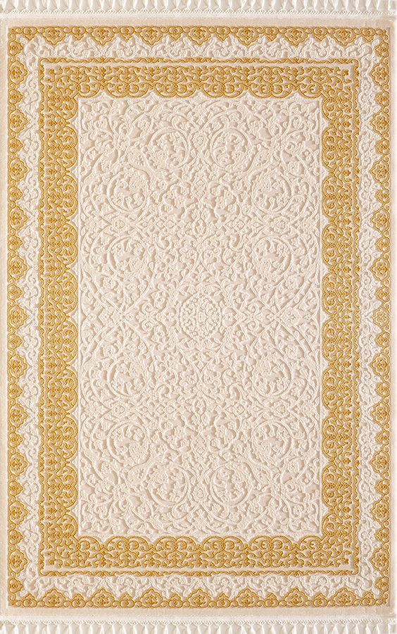 a yellow and white rug with an intricate design on the bottom, in front of a white background