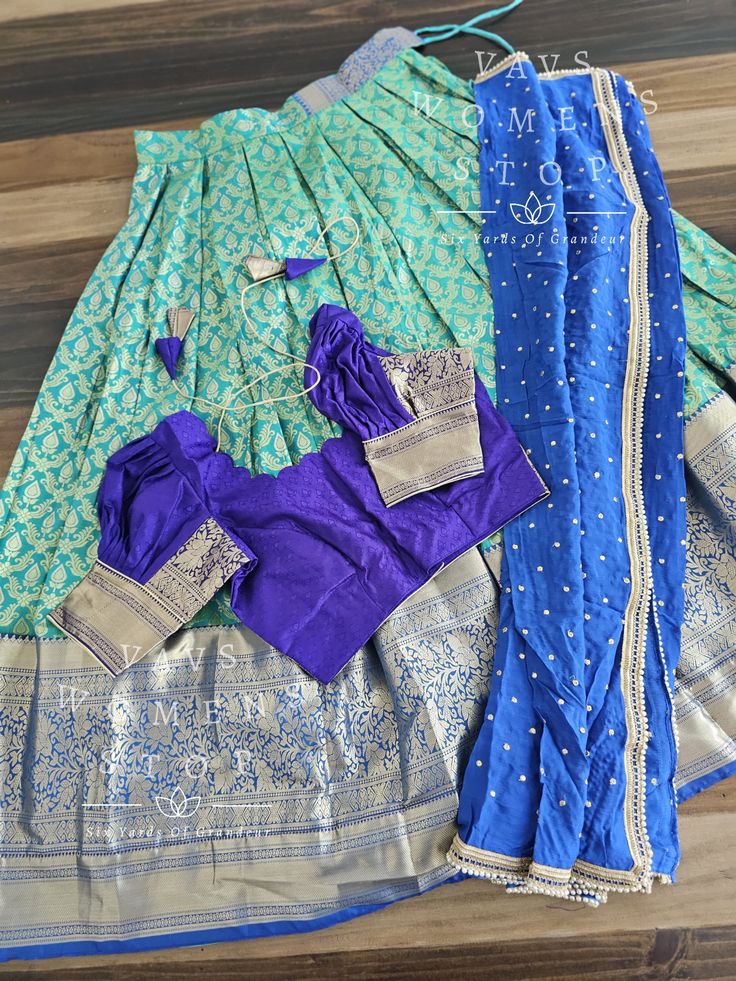 Lehenga And Blouse Fabric - Kanchi semi silkBlouse Size 34 with inner margins expandable upto 40 For Blouse size 32 alteration can be done on request.Padded - No If needed lehenga measurement, please message me in advance before purchasing. Fitted Silk Lehenga With Self Design, Fitted Silk Lehenga With Motifs, Fitted Banarasi Silk Lehenga With Motifs, Fitted Tilla Choli For Transitional Season, Semi-stitched Slub Silk Lehenga With Pallu, Blue Silk Lehenga With Unstitched Blouse, Semi-stitched Blue Tussar Silk Lehenga, Blue Semi-stitched Cotton Silk Lehenga, Blue Semi-stitched Dola Silk Choli