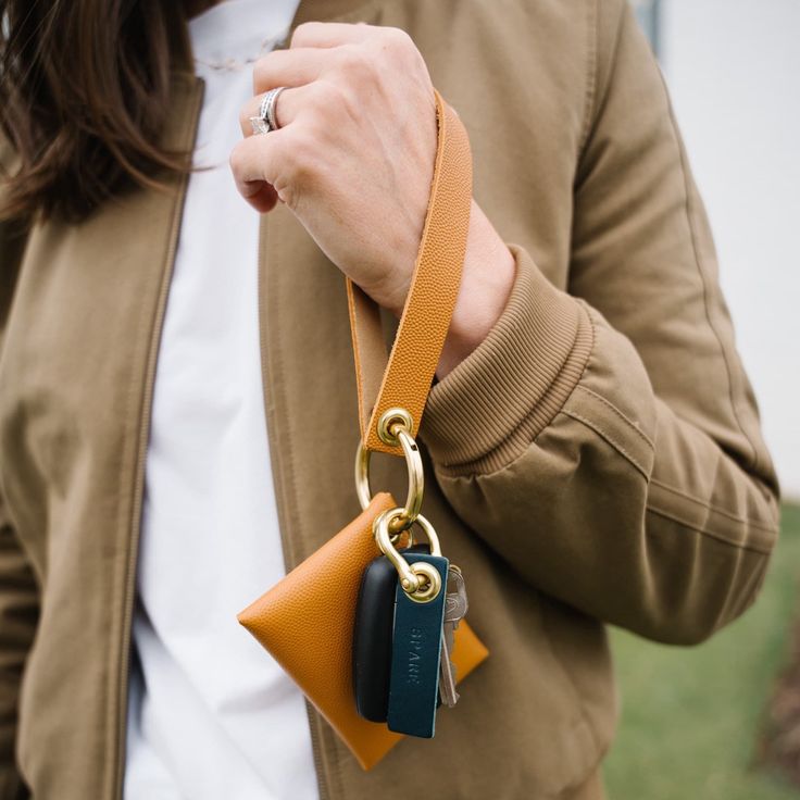 Keys? Check. Wallet? Check. Free Hand? Check. The set includes our wristlet, keyring, and card wallet for the ultimate grab-and-go convenience without sacrificing style. To mix wristlet and card wallet colors, shop wristlets and card wallets separately. Handcrafted in Greenville, South Carolina. Rectangular Wristlet For Daily Use, Trendy Wristlet For Everyday Use, Everyday Rectangular Wristlet With Wrist Strap, Modern Wristlet With Wrist Strap For Everyday Use, Modern Everyday Wristlet With Wrist Strap, Everyday Leather Wallets With Wrist Strap, Versatile Wristlet For Everyday Use, Versatile Leather Wristlet For Travel, Trendy Wristlet With Keychain For Everyday