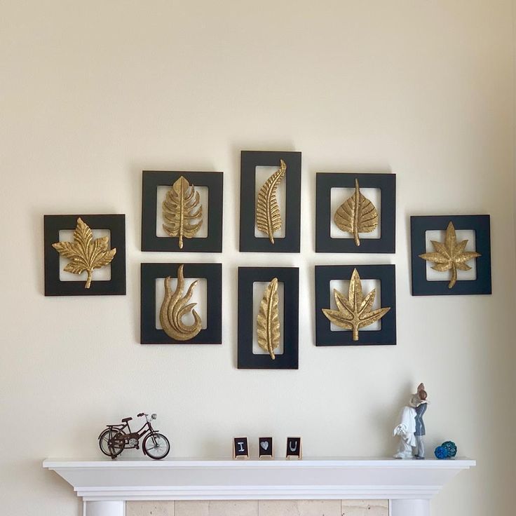 a living room with a fire place and pictures on the wall