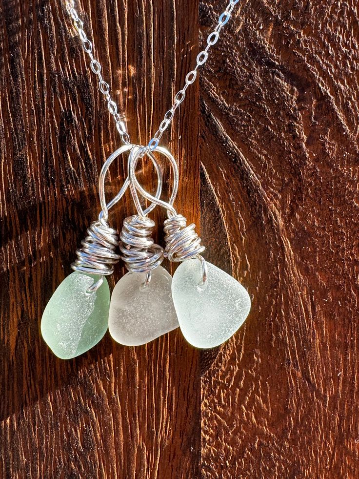 Mini Trio Seaglass Necklace  Wear pieces together or separately.  Sold with a sterling silver, 1.3mm flat cable, adjustable chain at 16 and 18 inches with springring clasp Silver Wire-wrapped Necklace With Recycled Glass, Silver Wire Wrapped Necklace With Recycled Glass, Wire Wrapped Silver Jewelry With Recycled Glass, Wire Wrapped Silver Recycled Glass Jewelry, Adjustable Wire Wrapped Necklace In Recycled Glass, Adjustable Wire Wrapped Necklaces In Recycled Glass, Nickel-free Silver Necklaces Made Of Recycled Glass, Nickel-free Silver Necklaces With Recycled Glass, Nickel-free Silver Necklace Of Recycled Glass