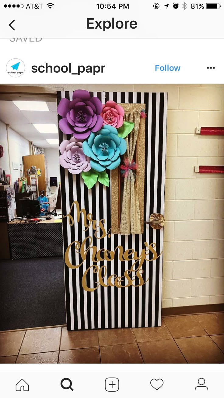 an image of a door decorated with paper flowers and the words school paper on it