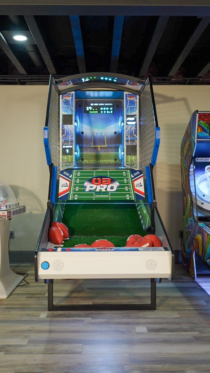 an arcade machine in the shape of a football field