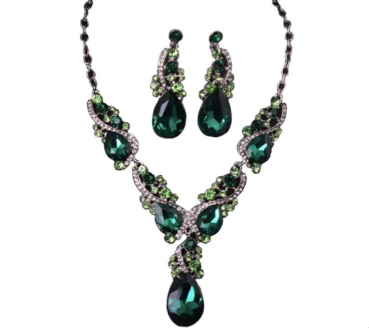 PRICES MAY VARY. Silver Tone Antique Style Art Deco Dark Hunter Forest Green Emerald Peridot Rhinestone Statement Wedding Bridal Prom Chunky Statement Earrings Necklace Gift Set Necklace measures 18" inches long including extension chain. Looks great worn short and close to the neck as a choker/collar necklace or worn long on the chest. Large Long earrings measure 2.25" inches long x .75" inches wide. Perfect for formal events, prom, pageant, drag queen, Gatsby party, wedding and bridal accessor Slytherin Wedding, Emerald Green Jewelry, Green Statement Earrings, Hunter Green Dresses, Dark Hunter, Choker Collar Necklace, Style Art Deco, Gatsby Party, Prom Jewelry