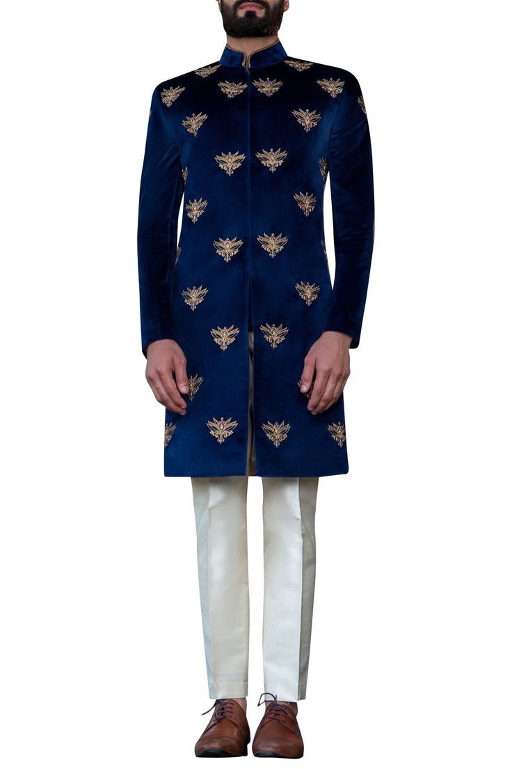 Navy blue achkan-style sherwani with all over hand embroidered motifs.
Components:1
Hand embroidered
Neckline:Mandarin collar
Sleeve Length:Full
Fabric:Velvet
Color:Blue
Single button on sleeve hem
Closure: Concealed front placket
Note: Safa and pants worn by the model is not for sale - Aza Fashions Royal Blue Kurta For Ceremonial Occasions, Designer Embroidered Sherwani For Festivals, Royal Blue Ceremonial Kurta, Royal Embroidered Sherwani For Festive Occasions, Royal Blue Sherwani For Eid, Royal Kurta With Zari Work For Festive Occasions, Royal Festive Kurta With Zari Work, Royal Sherwani With Zari Work For Festive Occasions, Festive Royal Kurta With Zari Work