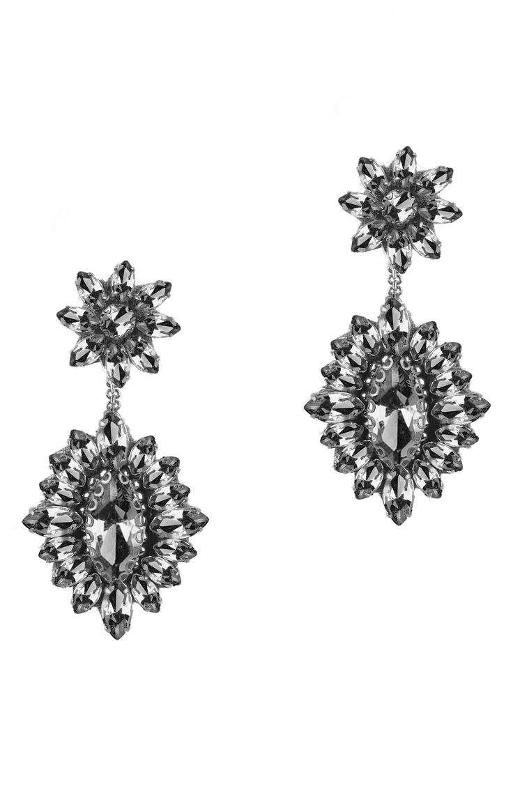 Exude extreme sparkle in these tonal crystal drop earrings anchored by floral clusters sure to make a glamorous statement. 2" drop, 1" width Post back Steel post back Goldtone plate/leather/glass/cotton Imported Holiday Capsule Wardrobe, Deepa Gurnani, Holiday Lookbook, Packing Clothes, Faux Wrap Top, Steel Post, Stocking Stuffer Gifts, Crystal Drop Earrings, Stunning Earrings