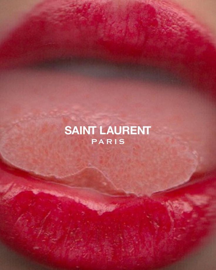 a red lipstick with the word saint laurent on it