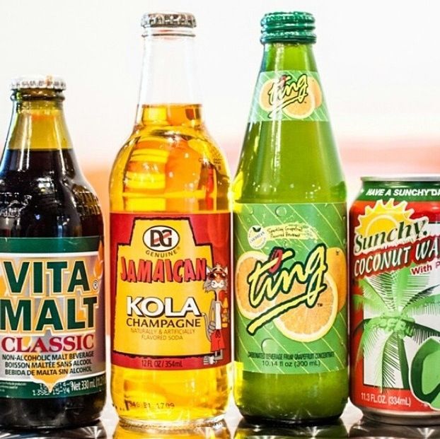 six different types of sodas lined up on a table