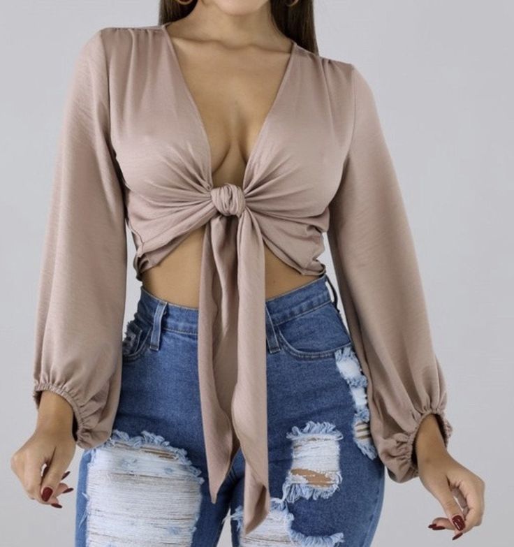 This top is perfect for your girls night, date, night, happy hour. It features a cozy stretch satin material with a ruffled elasticized end sleeve. Wear this with your perfect Jeans and make an effortless aappearance Flirty Crop Top For Date Night, Trendy Satin Top For Parties, Stretch Long Sleeve Crop Top For Date Night, Stretch Satin Crop Top For Night Out, Flirty Long Sleeve Crop Top For Night Out, Trendy Satin Top For Date Night, Feminine Long Sleeve Satin Tops, Spring Satin Stretch Crop Top, Glamorous Satin Top For Night Out