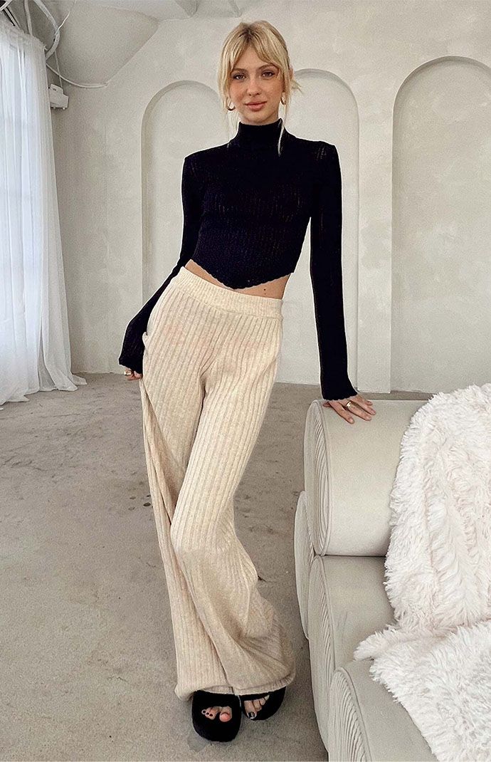 Comfort meets cozy chic in the new Montana Ribbed Knit Pants from Princess Polly. These classic high-waisted pants have a soft ribbed knit fabrication with an elasticized waistband, wide leg openings, and a relaxed fit. 

Sizing: XXS (US 0 / AU 4), XS (US 2 / AU 6), SML (US 4 / AU 8), MED (US 6 / AU 10), LRG (US 8 / AU 12), XL (US 10 / AU 14), XXL (US 12 / AU 16)


	Unlined
	Good stretch 
	Ribbed knit fabric
	Wide leg openings
	Relaxed fit
	Elastic waistband
	33% recycled polyester, 31 Wide Leg Pants Winter, Ribbed Knit Pants, Womens Loungewear Sets, Pants Cream, Cream Pants, Womens Knit Tops, Fleece Dress, Turtleneck Long Sleeve, Outerwear Outfit