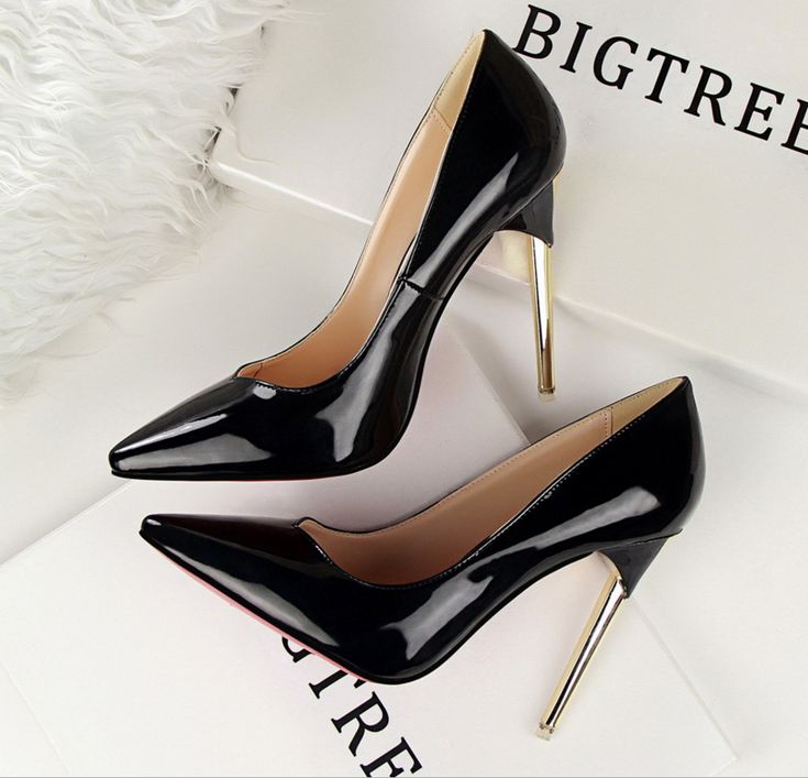 Pointed Heels For Party, Chic Pointed Court Shoes For Party, Chic Black Pointed Heels, Black Pointed Party Heels, Black Pointed Heels For Party, Pointed Toe Court Shoes With Wrapped Heel For Party, Evening Heels With Metal Feet And Pointed Toe, Glamorous Pointed Toe Heels With Metal Feet, Chic Pointed Heels For Party