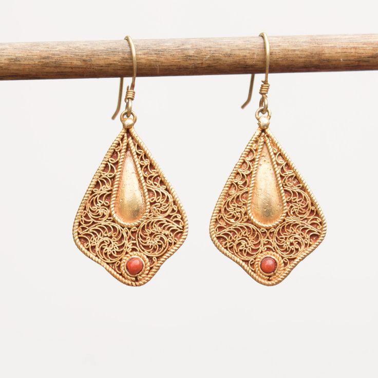 Coral set on filigree work 24k vermeil earrings Approximate dimensions; L 1.65 X W 0.75 Inches Gold Sterling Silver Filigree Chandelier Earrings, Gold Filigree Sterling Silver Chandelier Earrings, Gold Plated Filigree Teardrop Jewelry, Teardrop-shaped Gold Plated Filigree Jewelry, Yellow Gold Pendant Earrings With Intricate Design, Gold Plated Pendant Earrings With Intricate Design, Pendant Earrings With Intricate Design In Yellow Gold, 22k Gold Dangle Earrings With Intricate Design, Gold Plated Filigree Jewelry As Gift