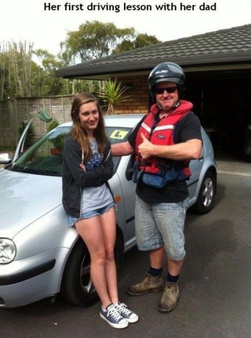 a man standing next to a woman in front of a car with the caption it's her first driving lesson, dad is taking some precaions