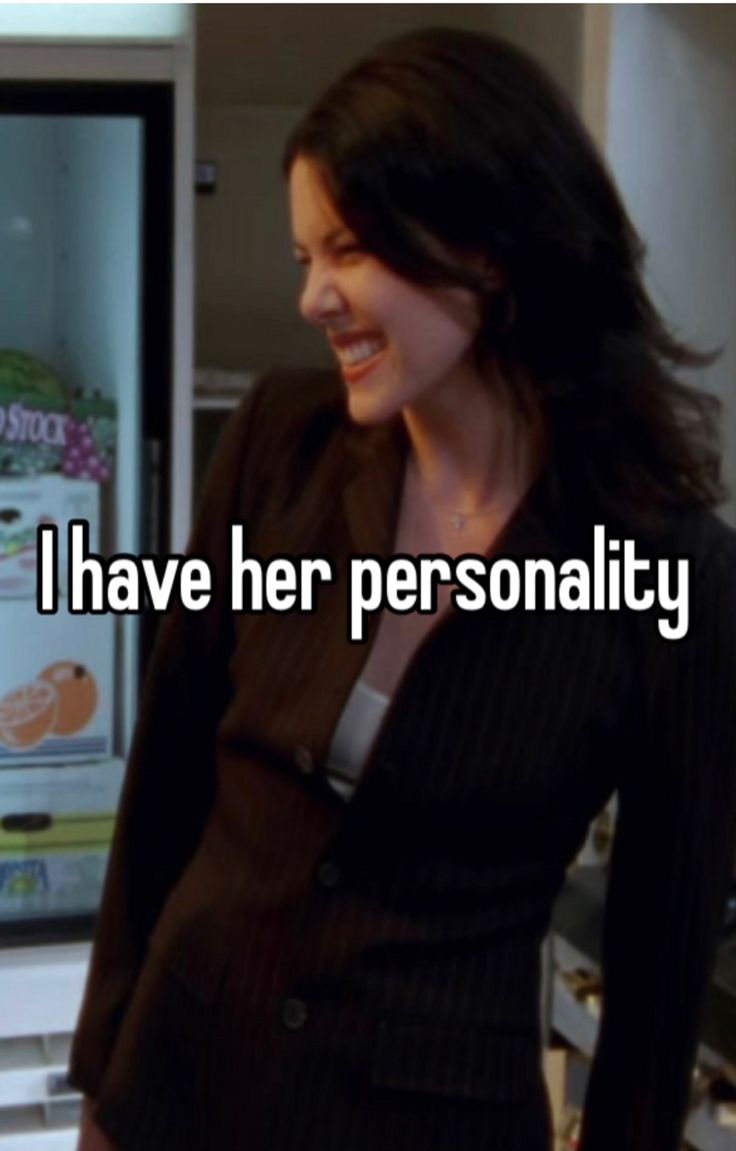 a woman standing in front of a refrigerator with the words i have her personality on it