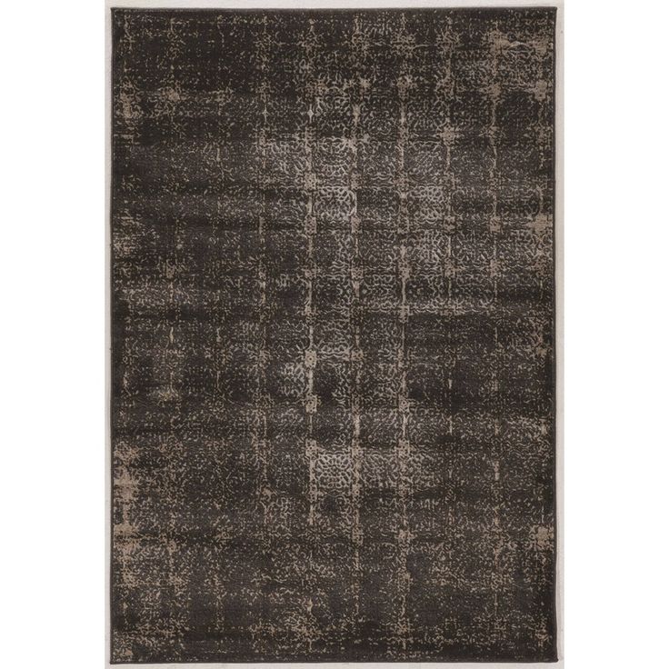 an area rug with black and grey squares